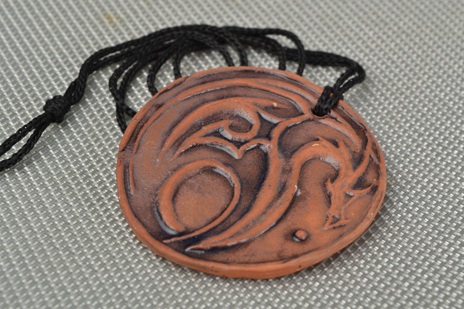 Handmade large brown ceramic round pendant with dragon image photo 1