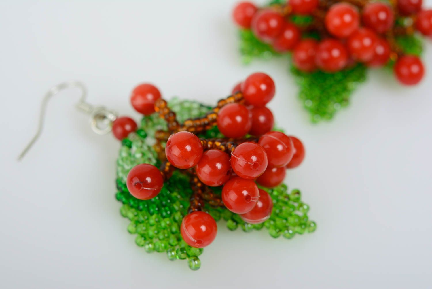 Red and green handmade woven beaded earrings with coral charms stylish photo 2