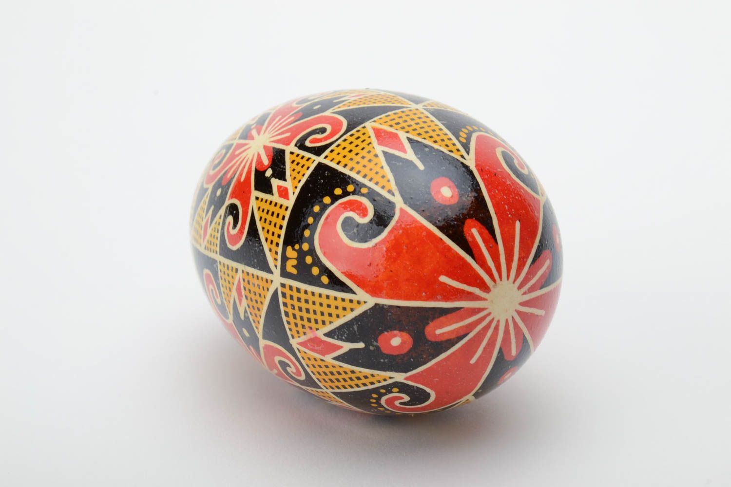 Homemade decorative Easter egg traditional pysanka painted in contrast colors photo 4