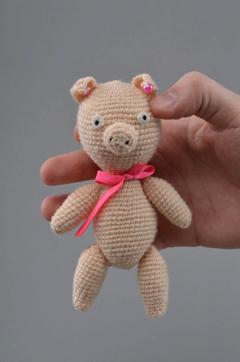 Soft crocheted toy pig with a bow of beige color handmade home decor photo 4