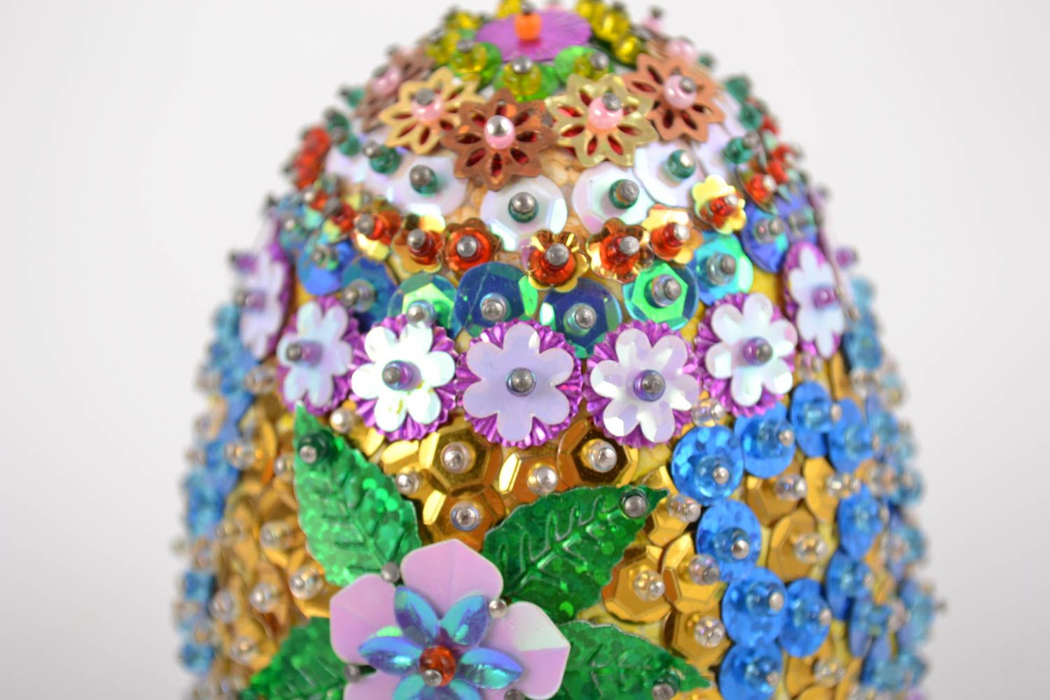 Handmade decorative colorful Easter egg embroidered with beads and spangles photo 2