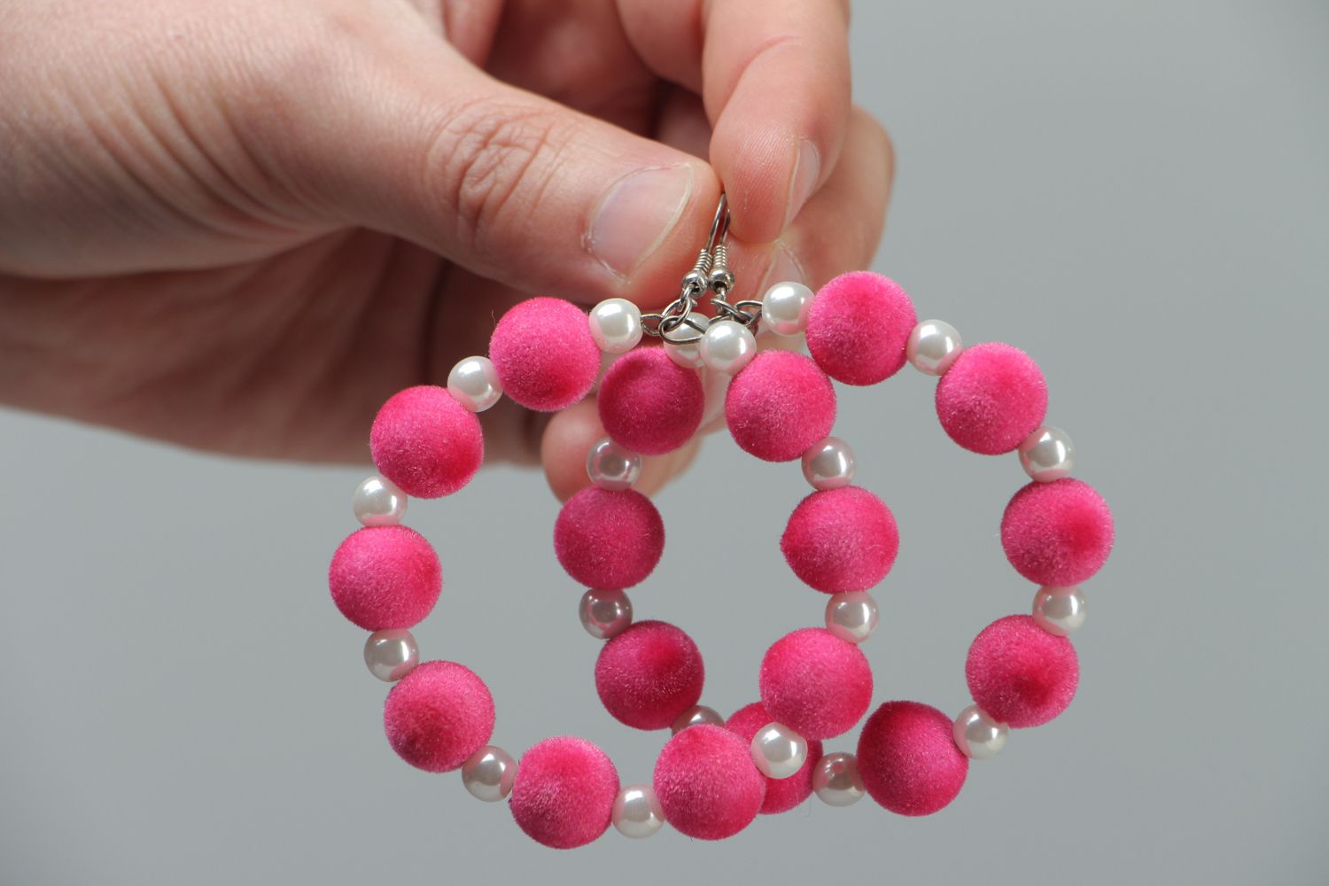 Large hoop earrings of pink color photo 3