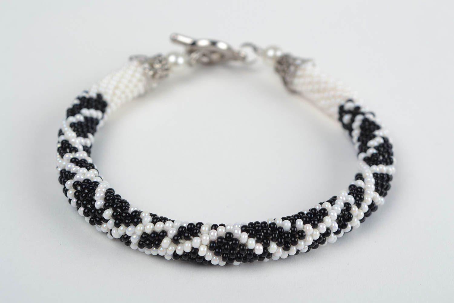 Women's handmade designer woven beaded cord bracelet black and white photo 4