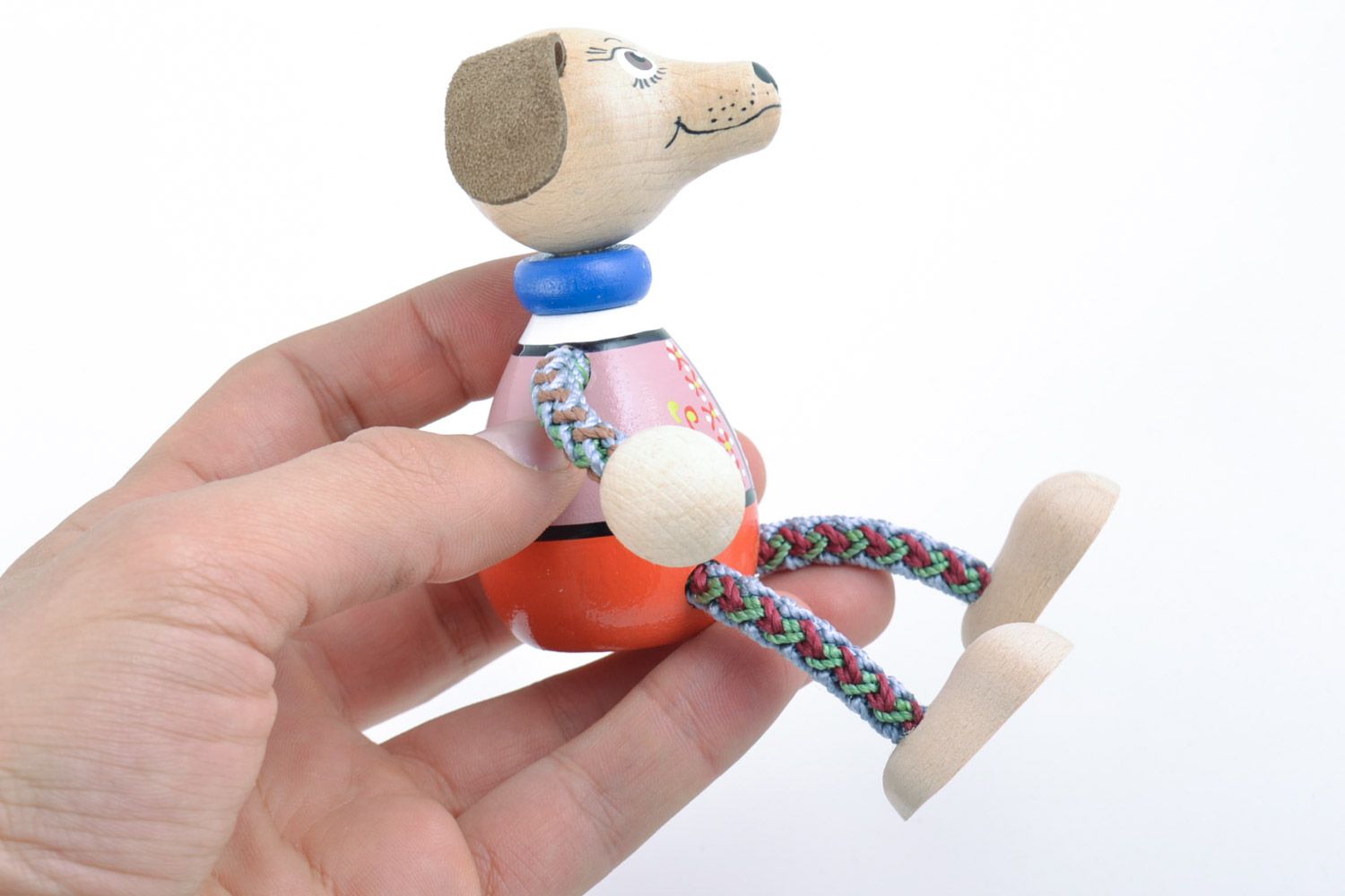 Homemade painted eco friendly wooden toy dog with cord paws for children photo 2