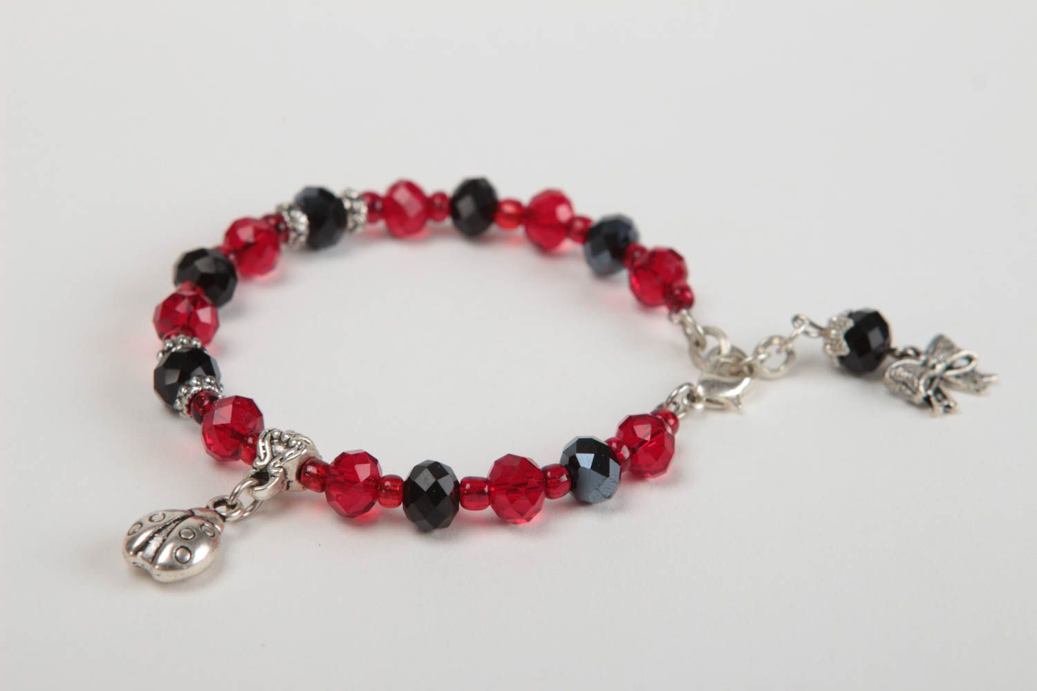 Dark red and black beads bracelet with silver ladybug charm for girls photo 3