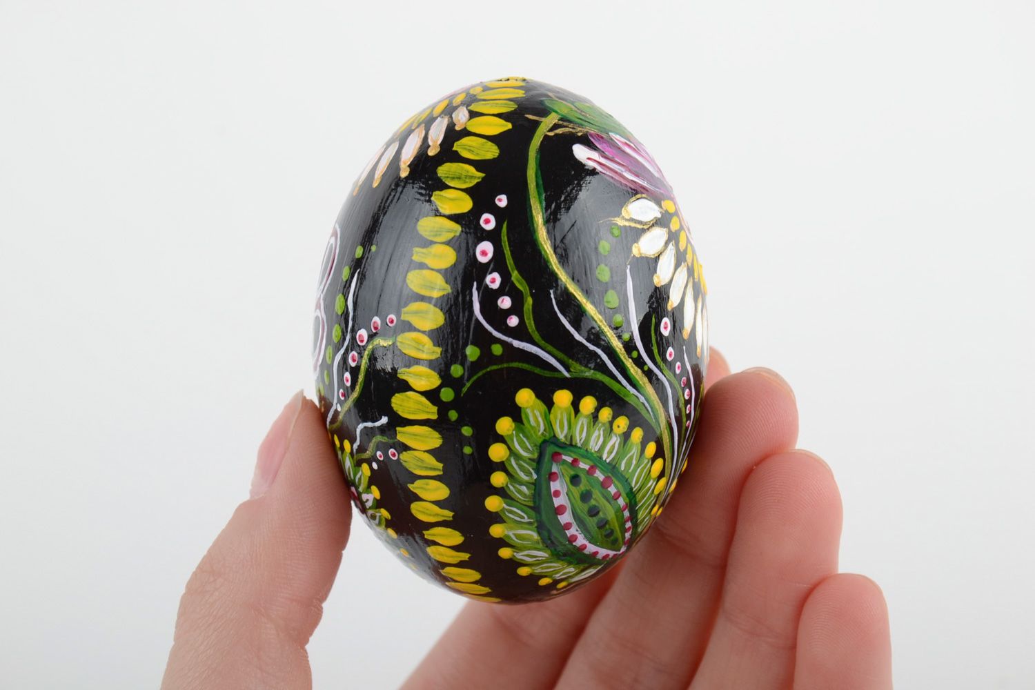 Handmade wooden Easter egg painted with floral ornaments for interior decoration photo 5