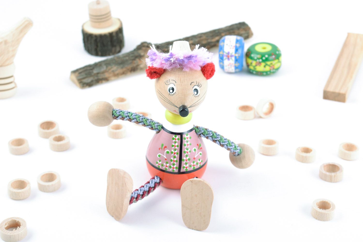 Beautiful wooden handmade toy mouse in ethnic clothing with head wreath photo 1