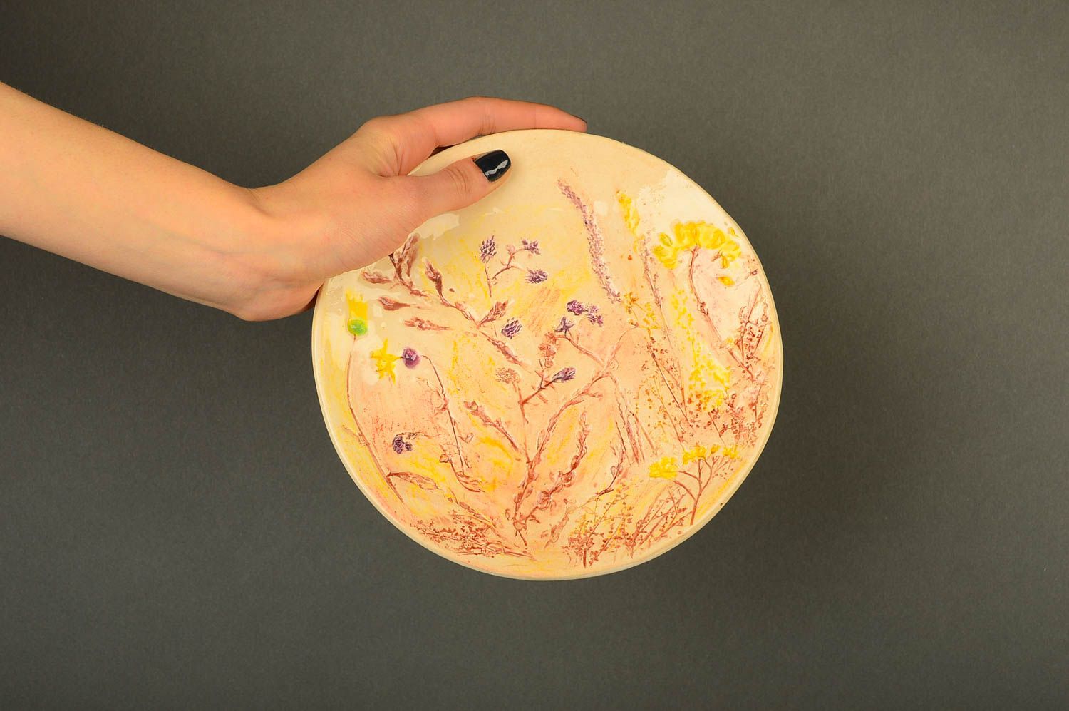 Painted handmade ceramic plate pottery works beautiful clay plate pottery works photo 2