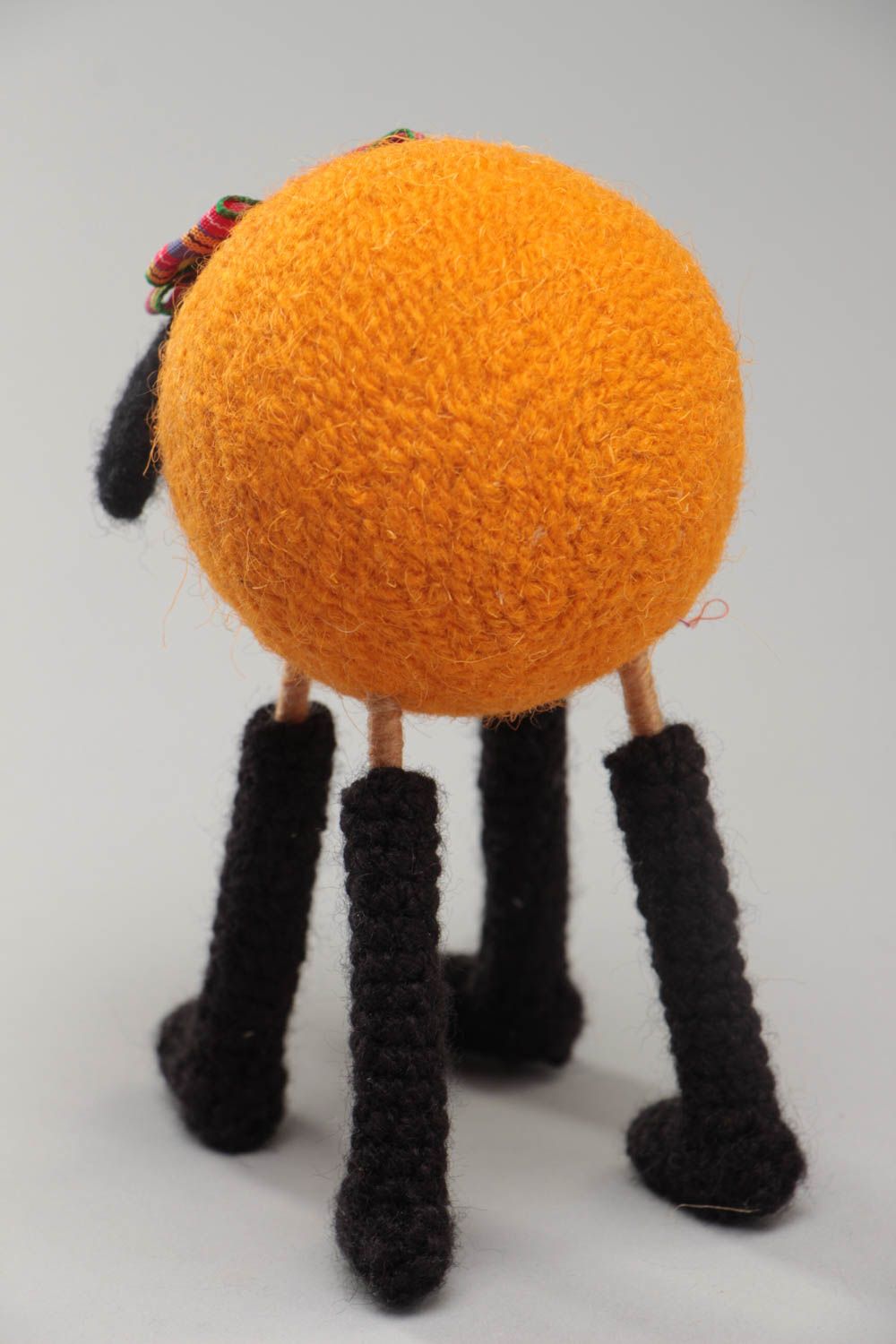 Handmade funny soft toy crocheted and felted of wool orange lamb on wooden paws photo 4