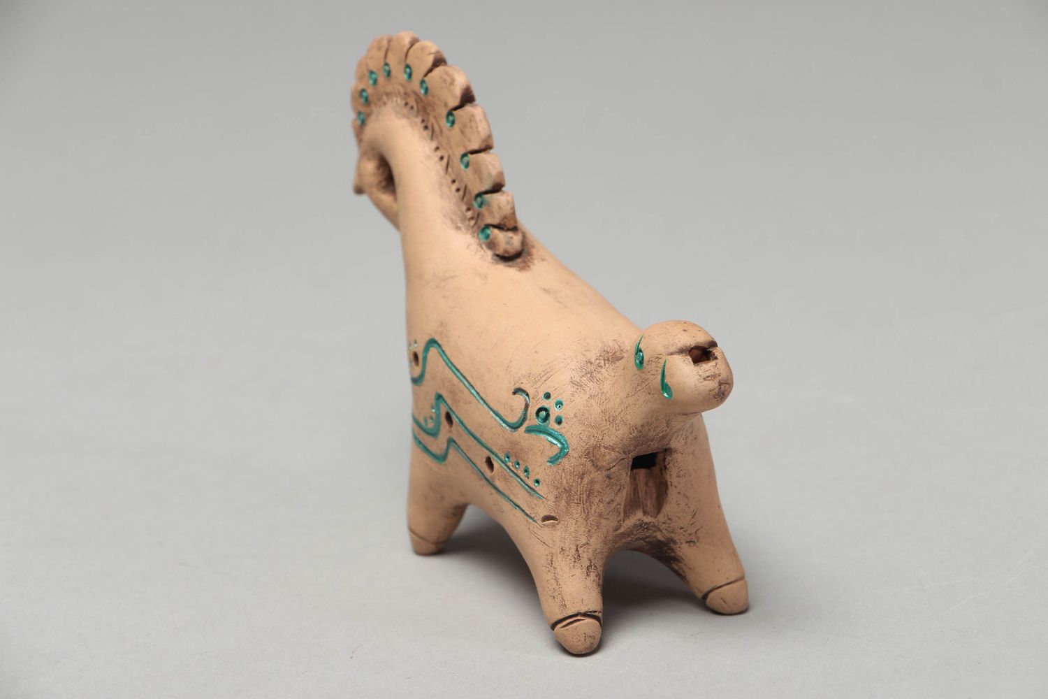 Clay penny whistle in the shape of horse photo 3