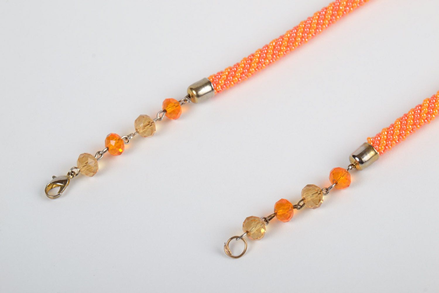 Beautiful stylish handmade women's long beaded necklace of orange color photo 3