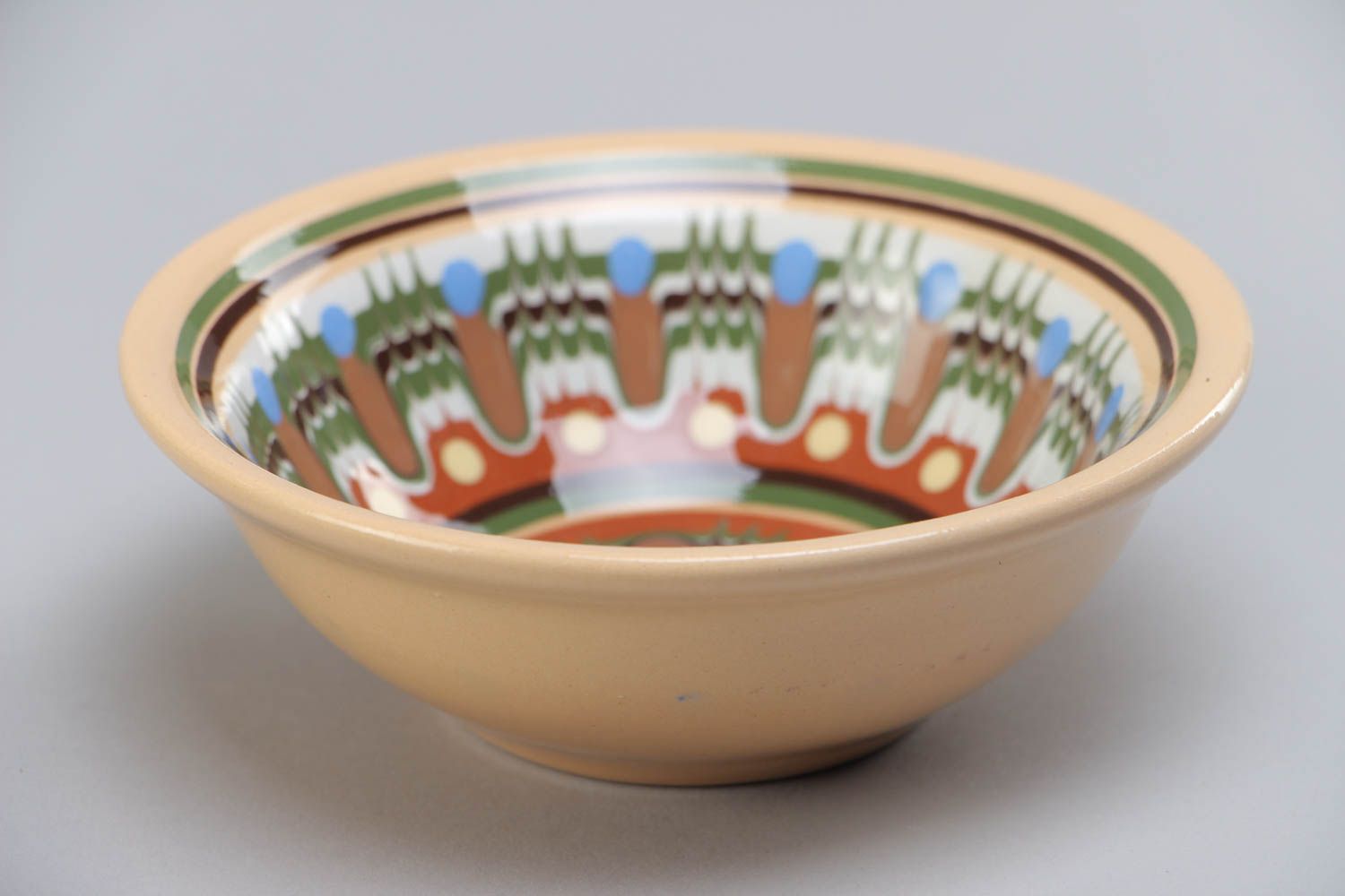 Deep ceramic bowl decorated with ornaments painted with glaze handmade 200 ml photo 2
