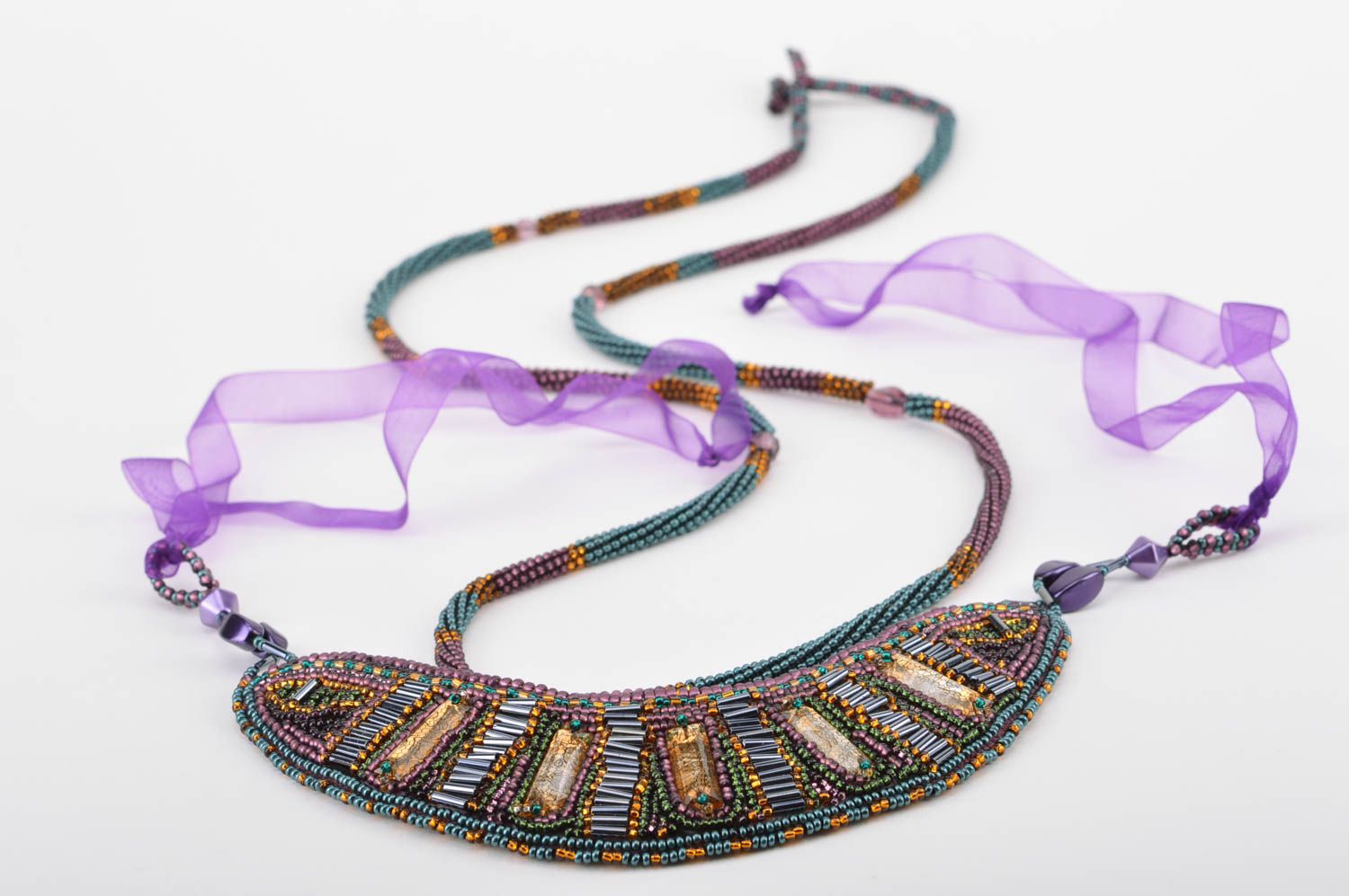 Conjunto de accesorios de abalorios artesanales collar y pulsera morados foto 1