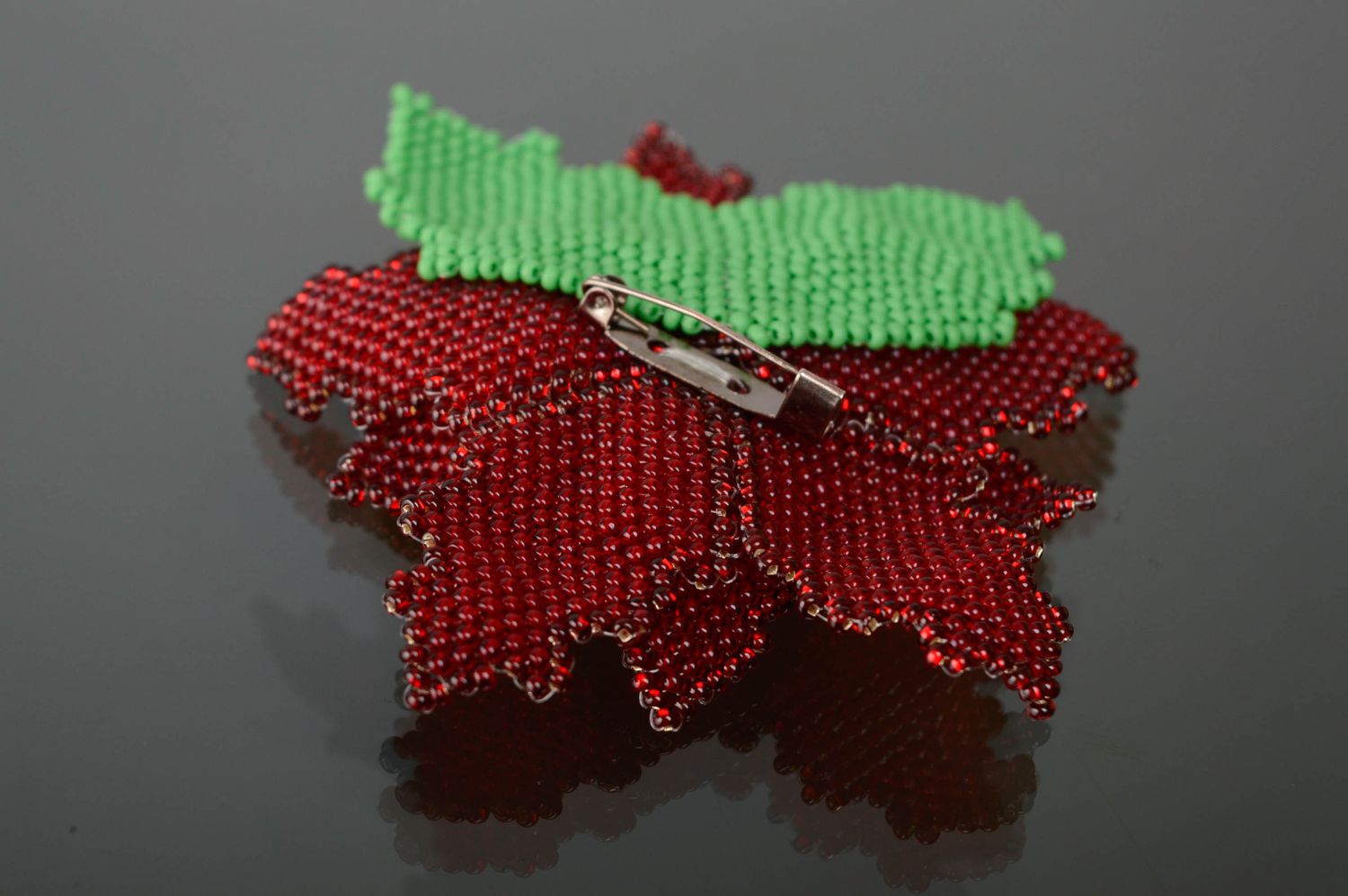Beaded brooch in the shape of red flower photo 2