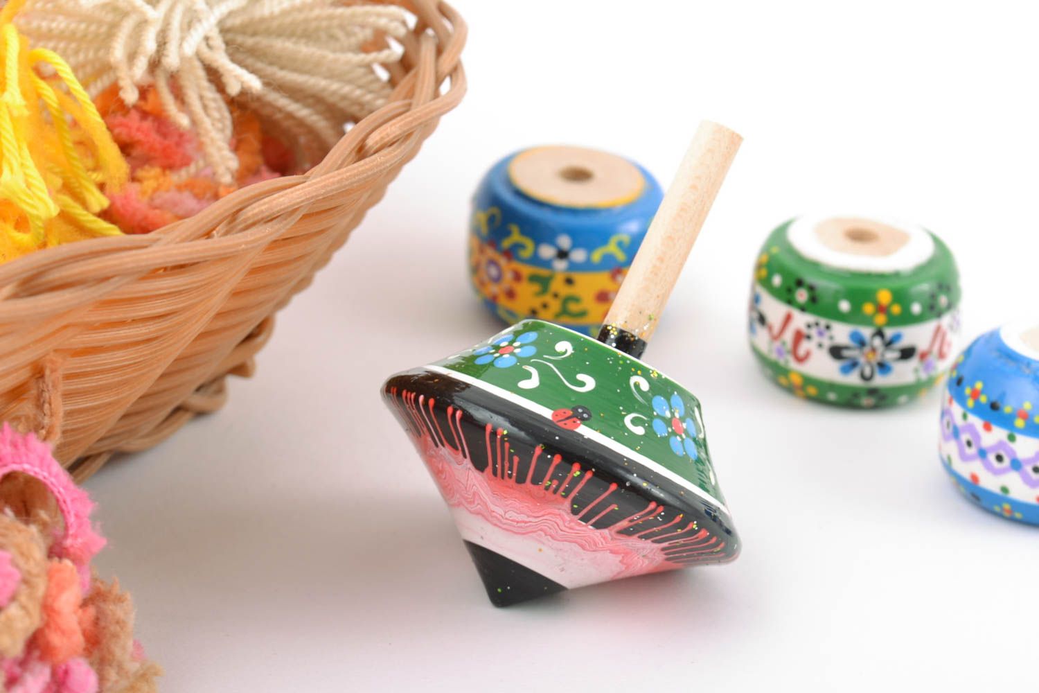 Beautiful colorful handmade wooden toy spin top with eco painting photo 1