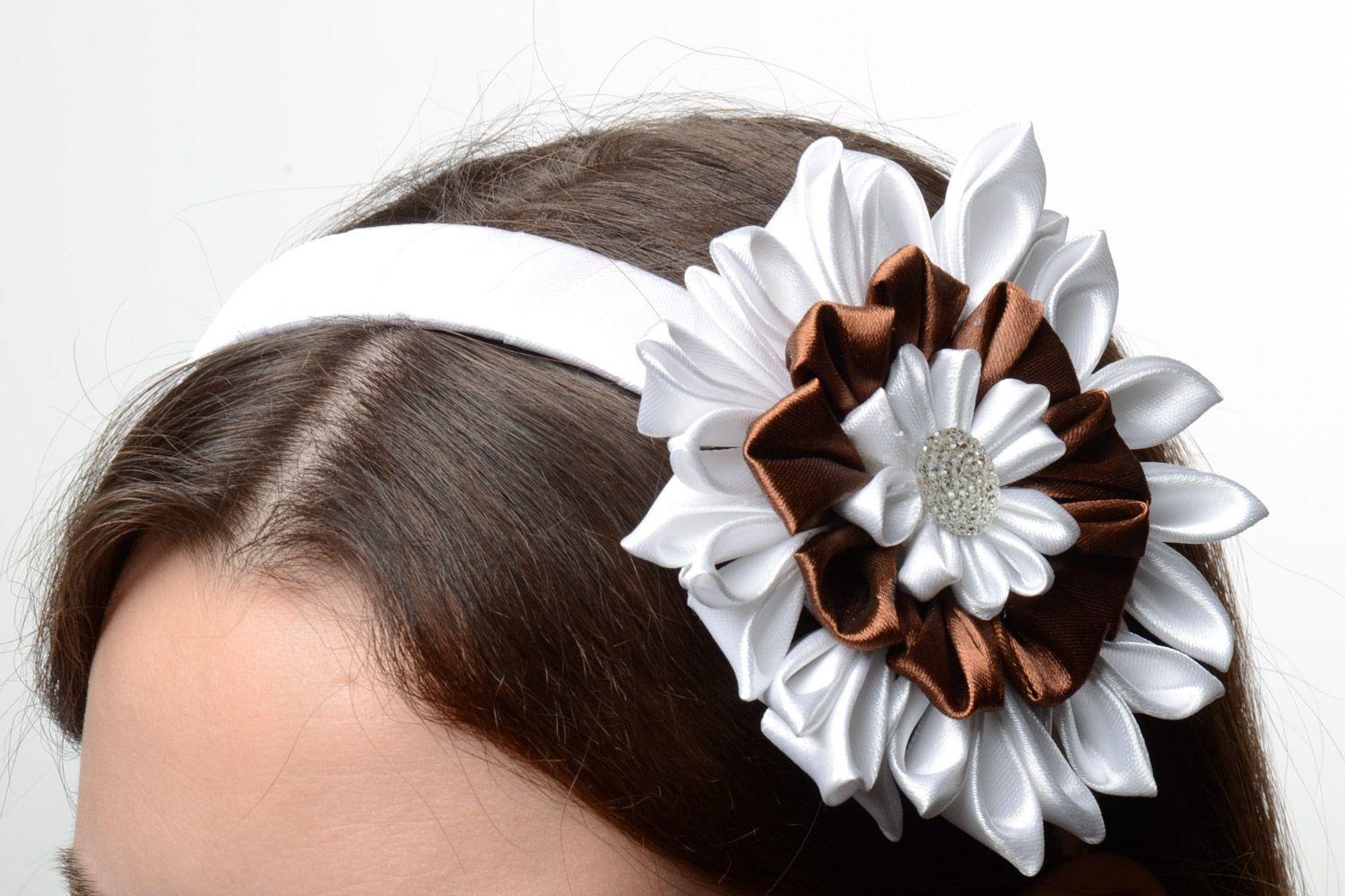 Handmade festive headband with volume satin ribbons kanzashi flower of white color photo 1