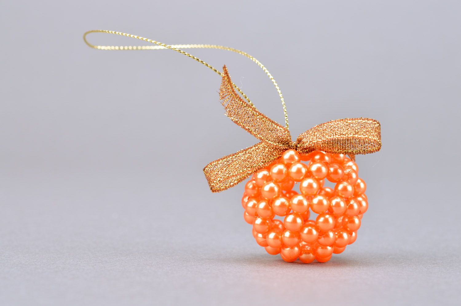 Handmade woven beaded interior pendant ball of orange color with eyelet photo 2