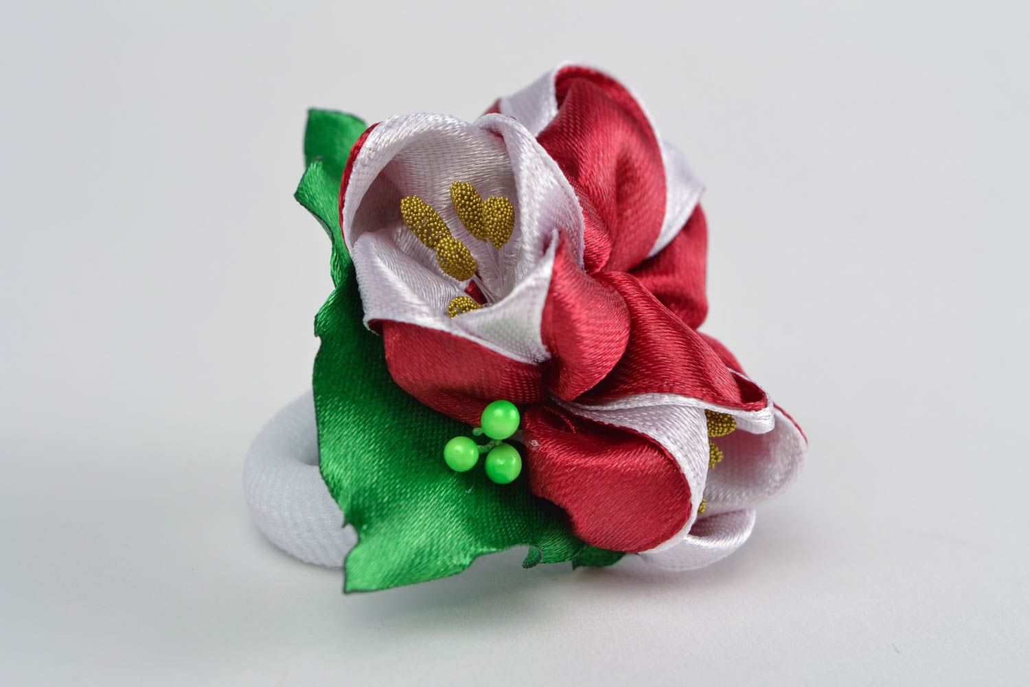 Children's handmade satin ribbon flower hair tie of red color photo 4