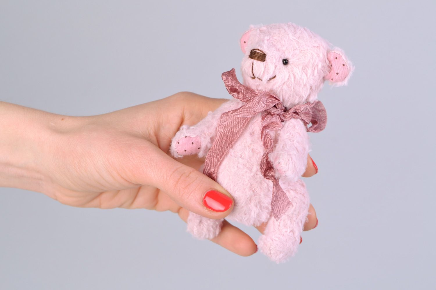 Small handmade designer soft toy bear of pink color with beautiful bow photo 2