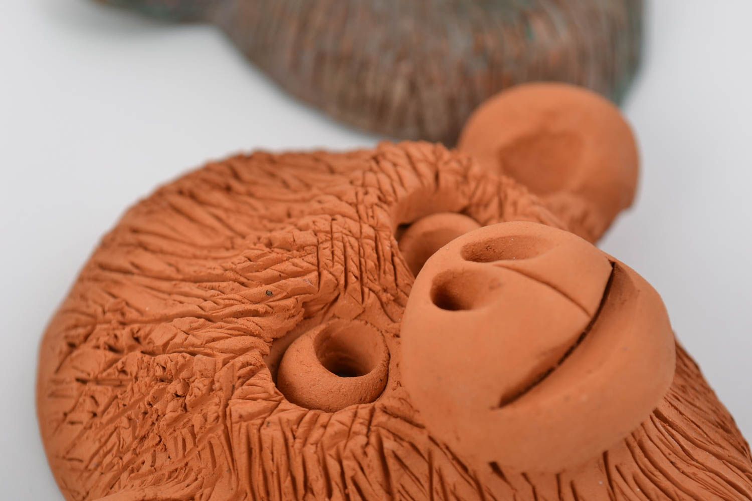 Maschere artigianali fatte a mano in ceramica souvenir da appendere al muro foto 5