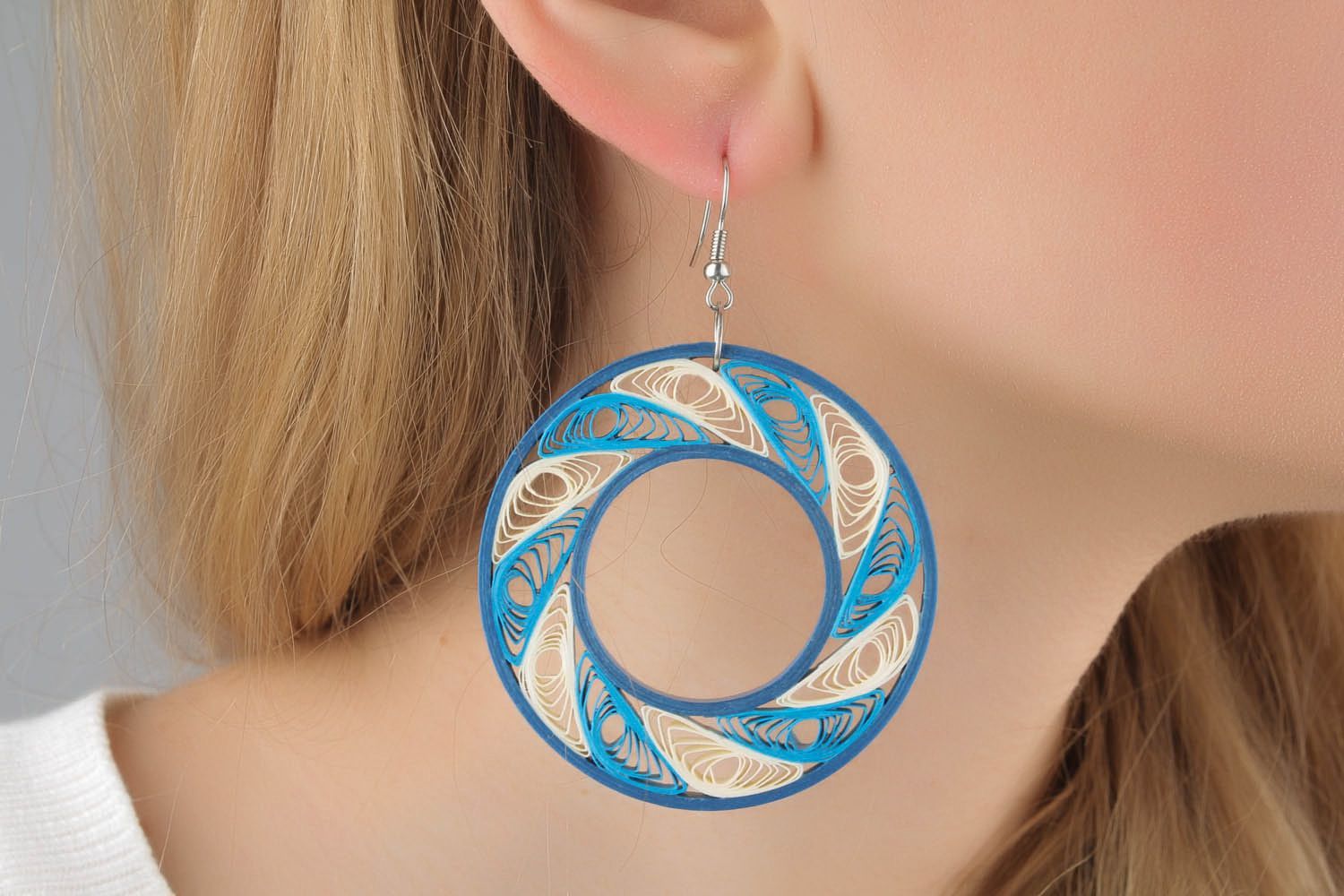 Round earrings made using the quilling technique  photo 1