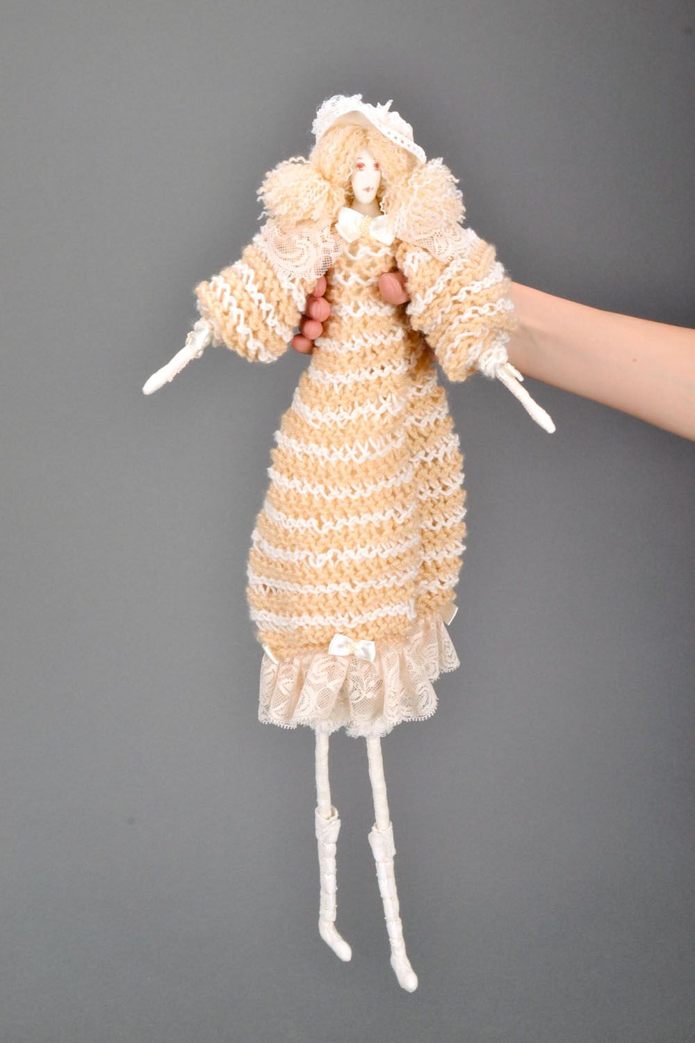 Designer knitted doll in cream dress photo 5