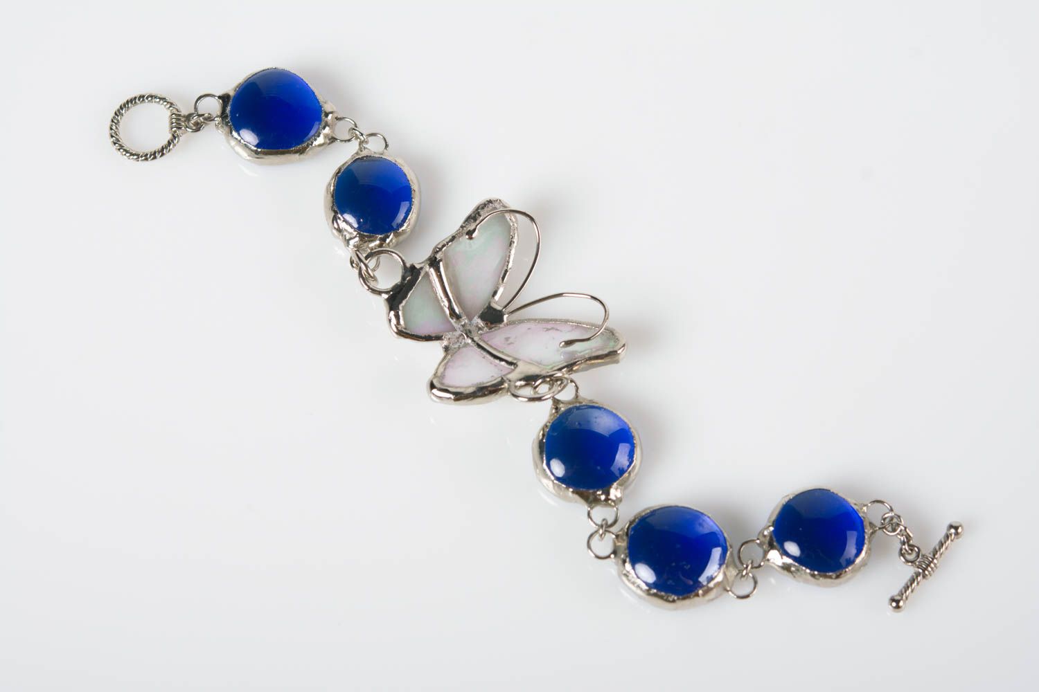 Handmade designer metal wrist bracelet with blue glass and butterfly photo 3