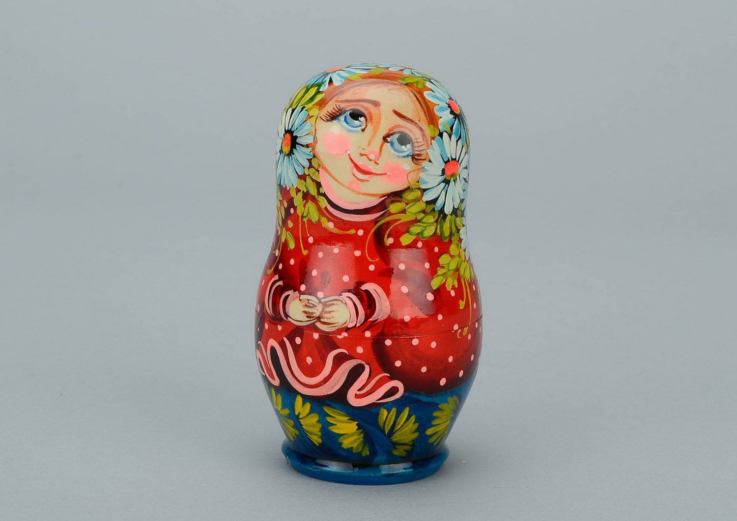 Nesting doll with daisies photo 1