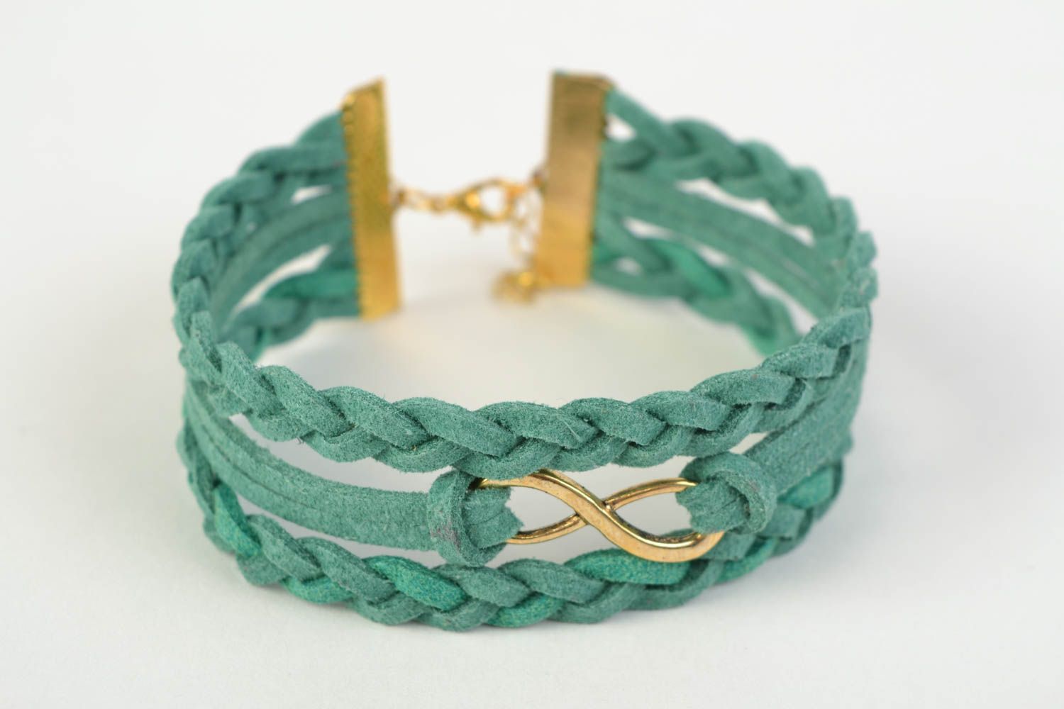 Handmade multi row suede cord woven wrist bracelet of turquoise color with charm photo 3