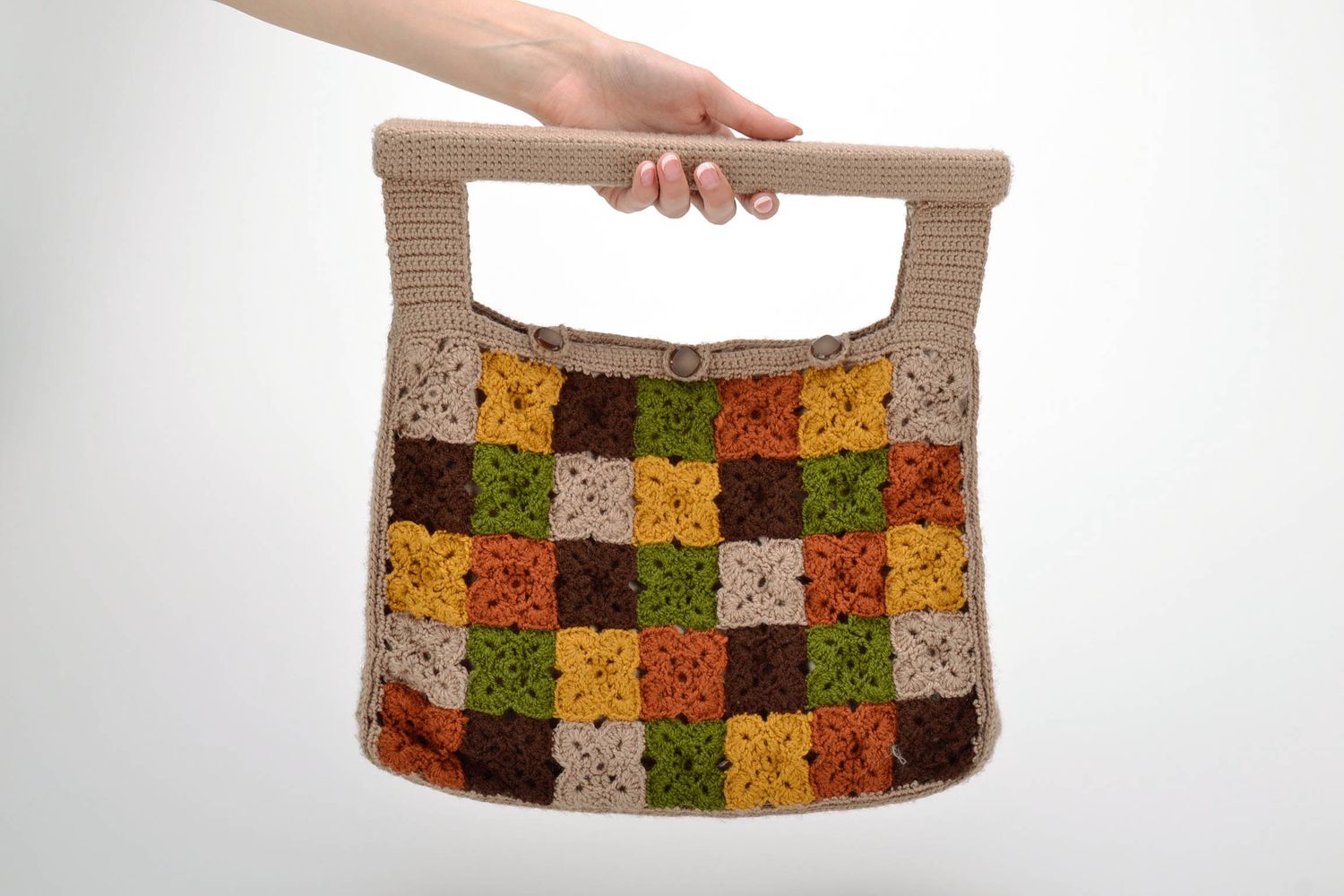 Knitted bag with wooden handles photo 2