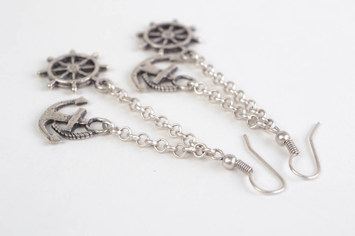 Handmade designer long dangling earrings cast of metal alloy anchor and wheel  photo 4