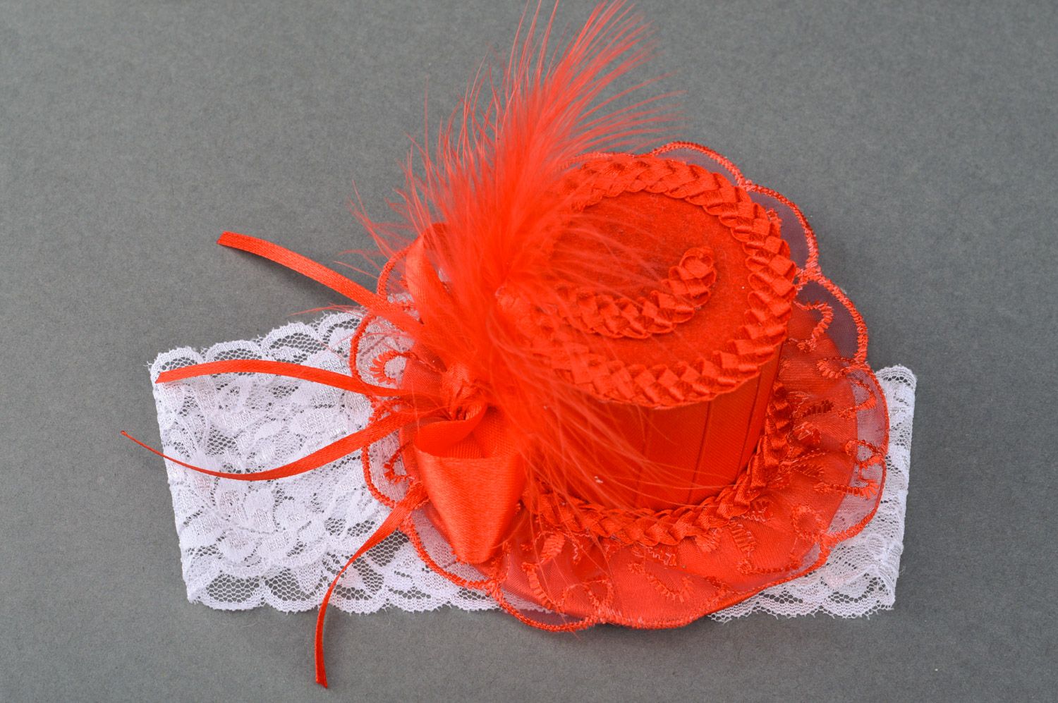 Handmade decorative white lacy headband with red satin top hat with feathers photo 4