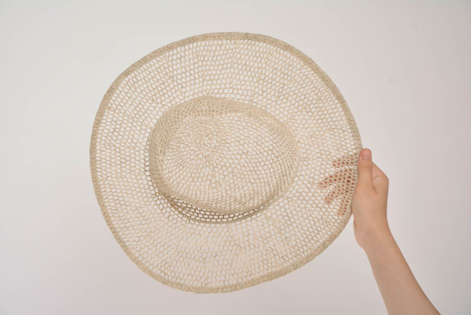 Designer openwork knitted hat made of linen handmade summer light accessory photo 2