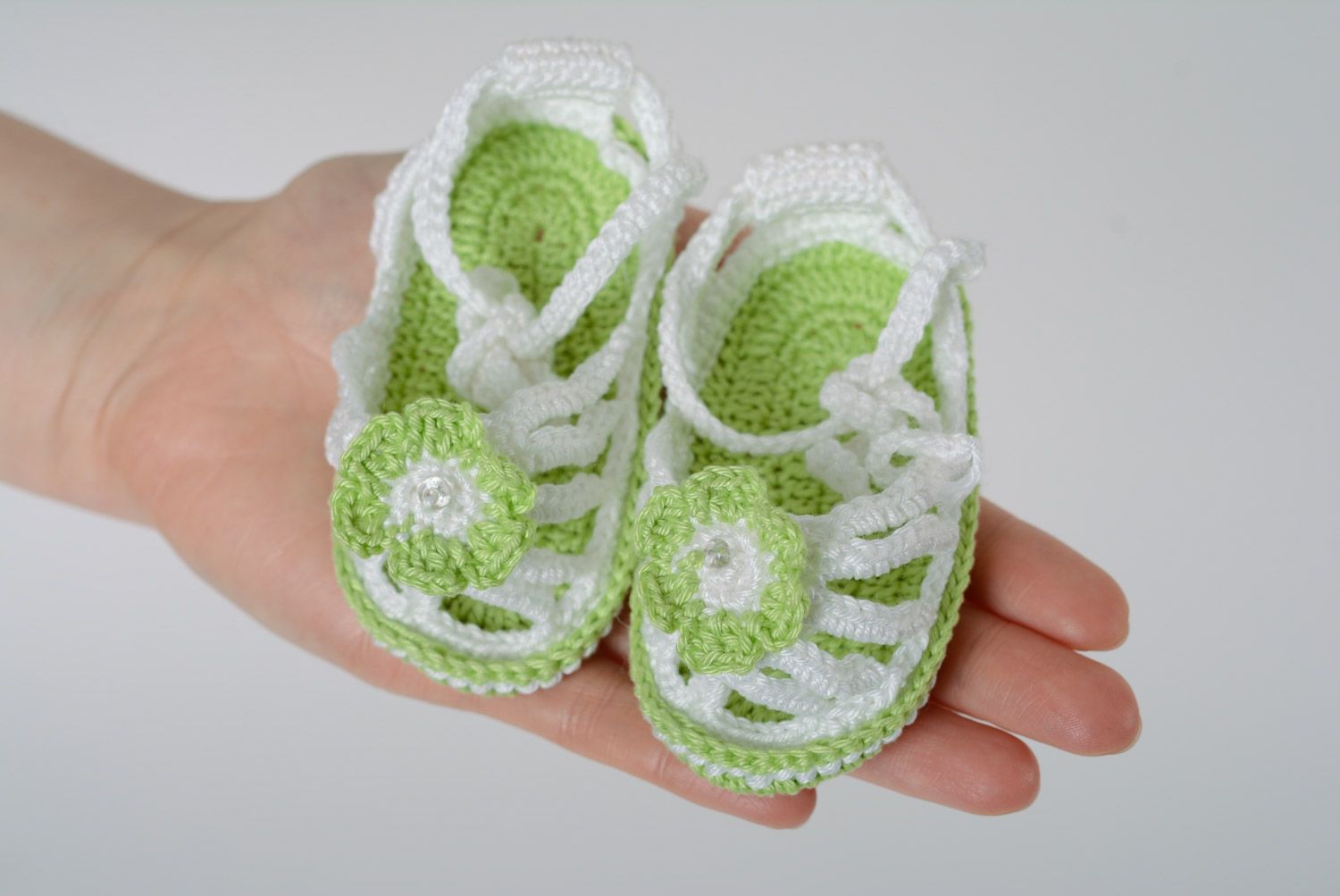 Handmade summer baby booties crocheted of white and green acrylic threads for girl photo 3