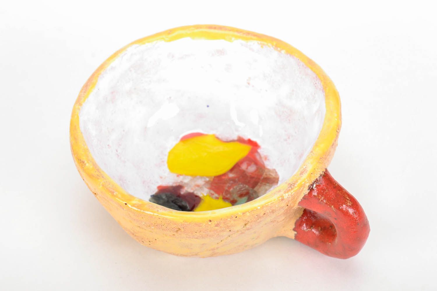 Hand-molded clay glazed cup in yellow and red colors. Wide cup with white inside glaze. photo 4