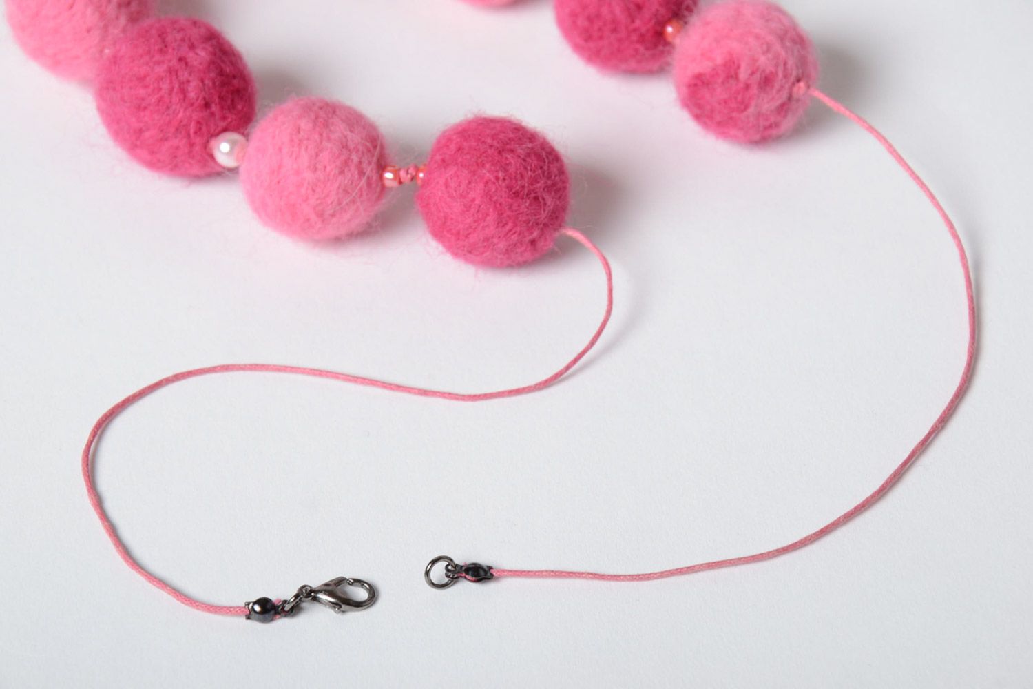 Beautiful pink soft wool ball necklace created using wet felting technique photo 4
