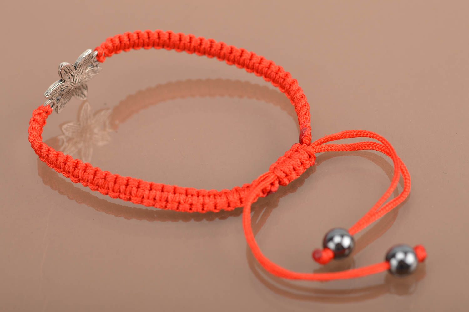 Beautiful red handmade design bracelet woven of silk threads with insert Flower photo 5