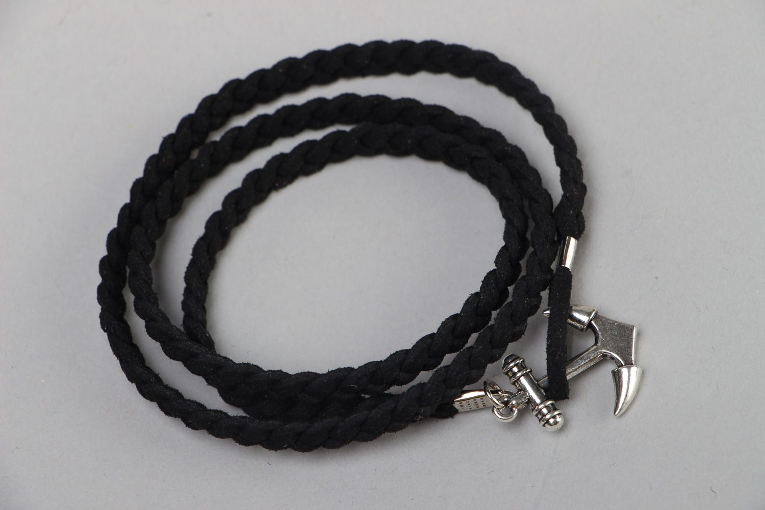 Handmade friendship bracelet woven of faux suede cord of black color with anchor photo 2