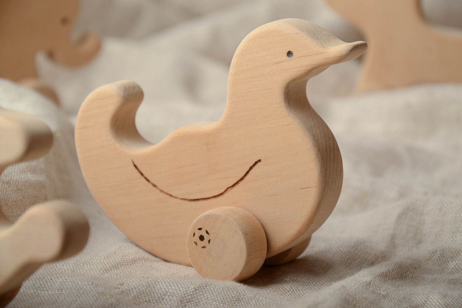 Wooden wheeled toy Duck photo 1