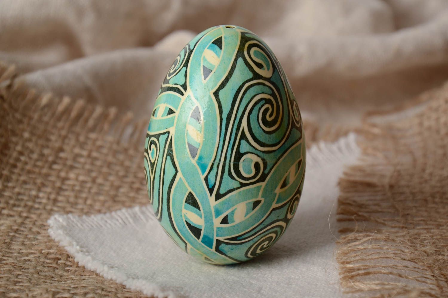 Handmade traditional painted decorative Easter goose egg of turquoise color photo 1