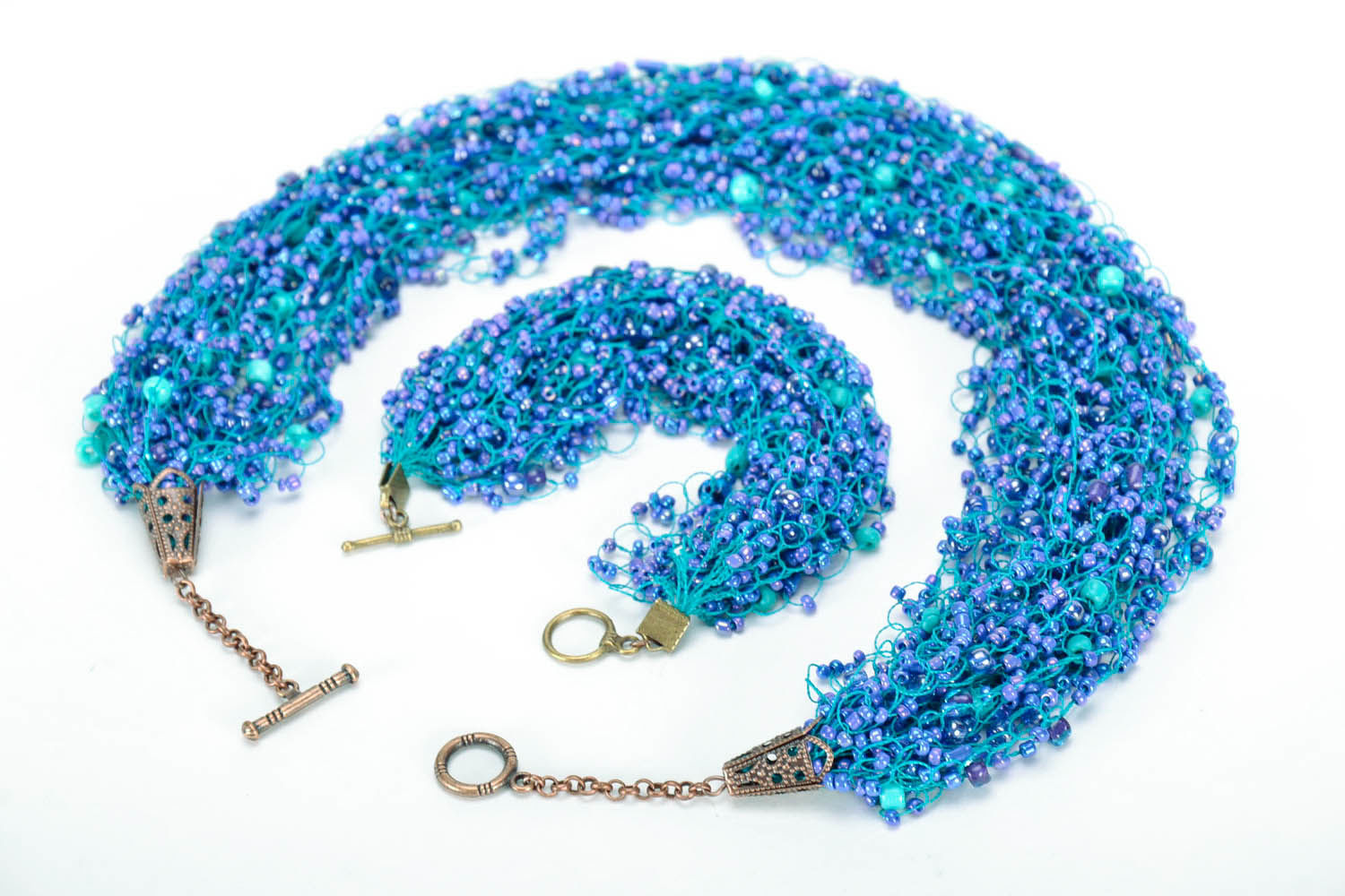 Parure de bijoux originale faite main Collier et bracelet bleus photo 1