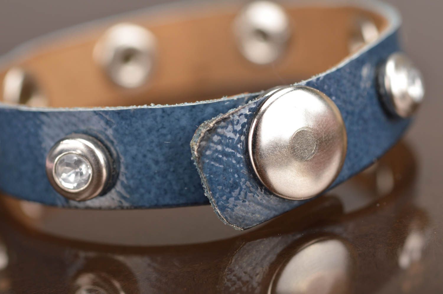 Exclusive handmade delicate leather bracelet with rivets in blue color photo 4