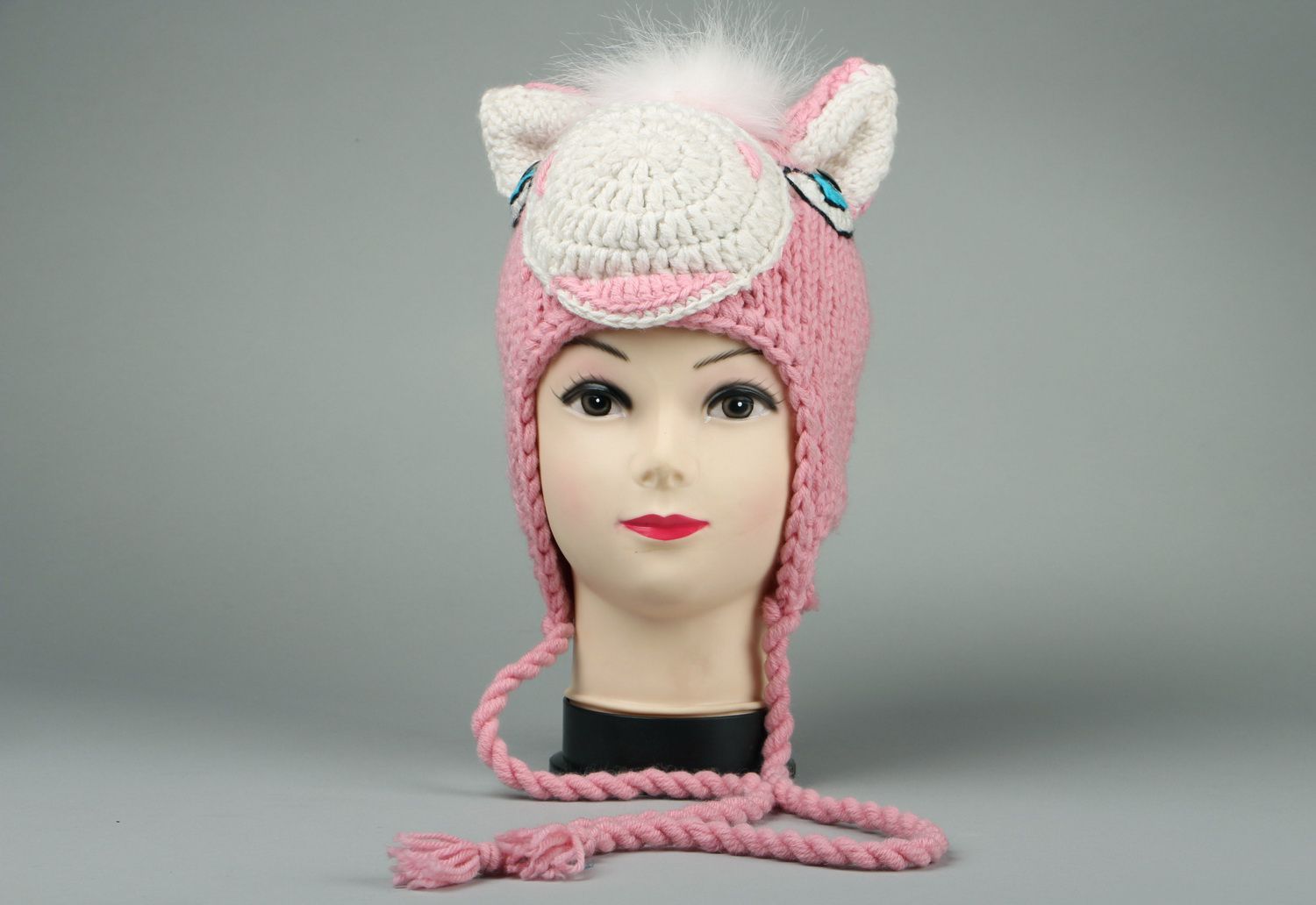 Knitted hat with fur photo 1