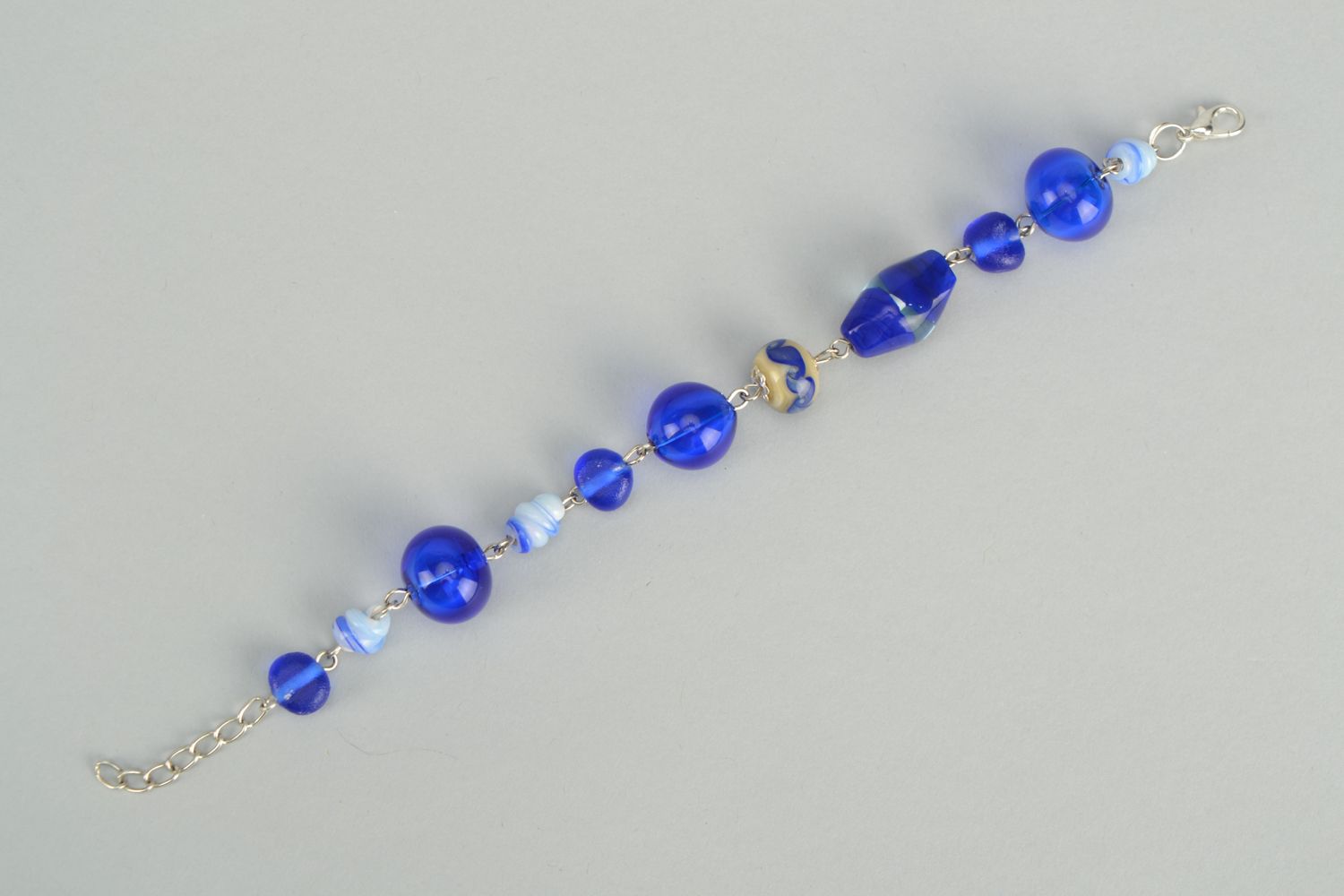 Interesting bracelet with blue lampwork glass beads photo 6