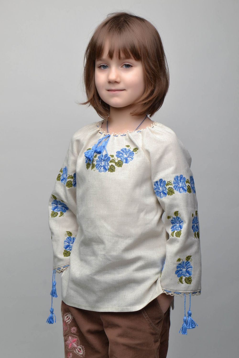 Children's cross stitched shirt photo 1