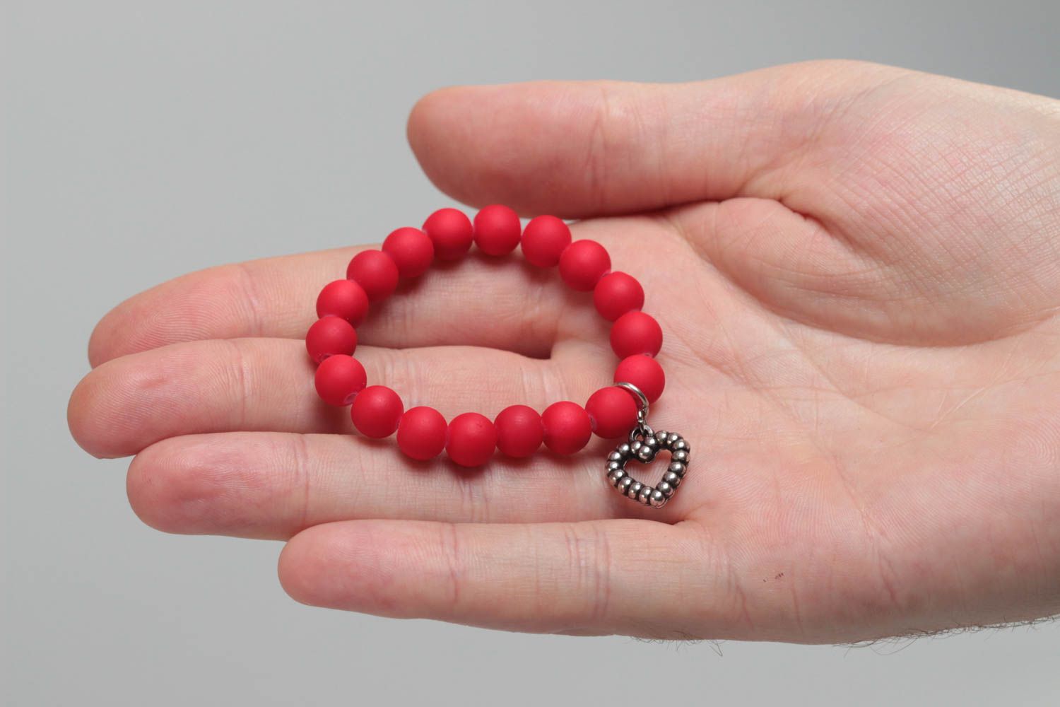 Red handmade children's wrist bracelet with plastic beads and heart charm photo 5