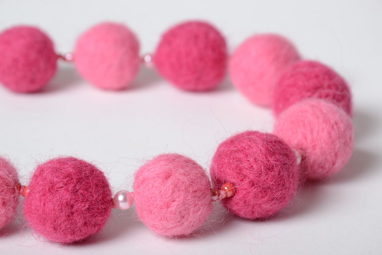 Beautiful pink soft wool ball necklace created using wet felting technique photo 3