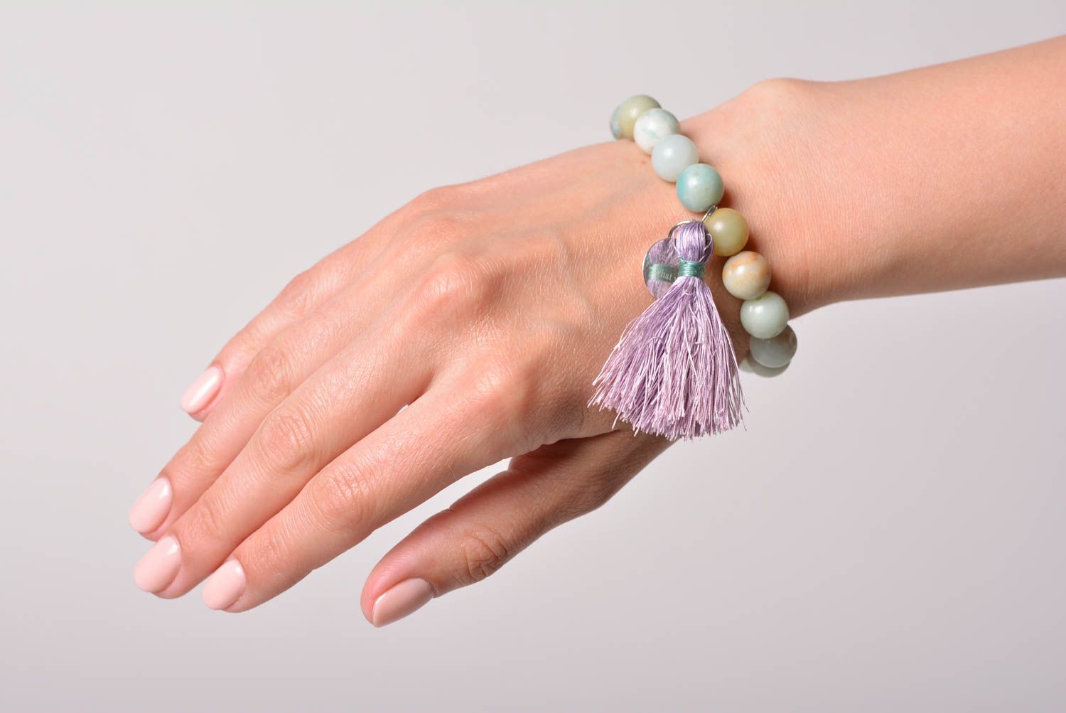 Handmade wrist bracelet with natural amazonite stone beads and thread tassels photo 1