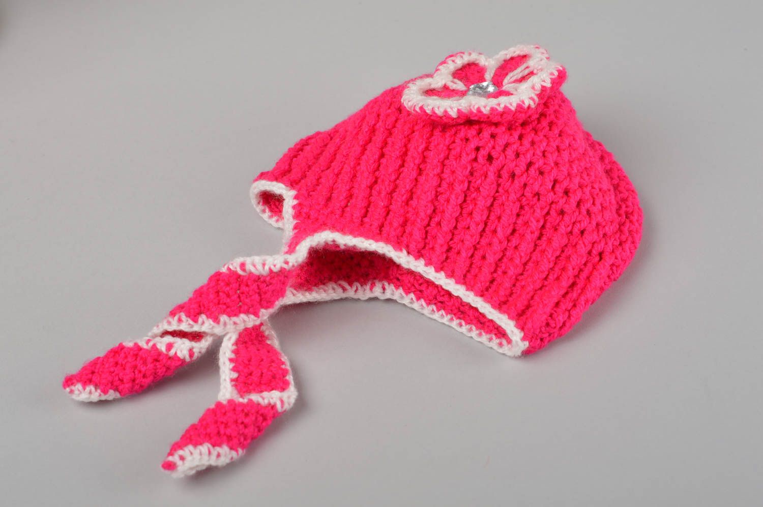 Bonnet tricot fait main Chapeau au crochet rose Vêtement enfant cache-oreilles photo 1