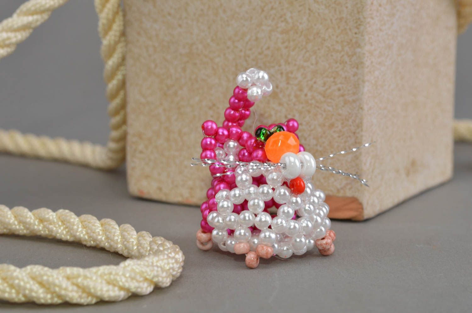 Handmade designer miniature animal figurine of pink white cat woven of beads  photo 1